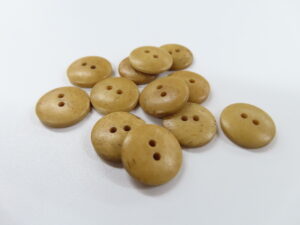 Bone buttons, 2 button holes
