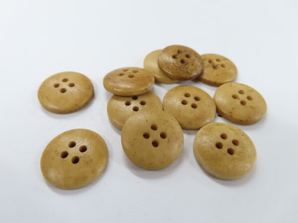 Bone buttons, 4 button holes